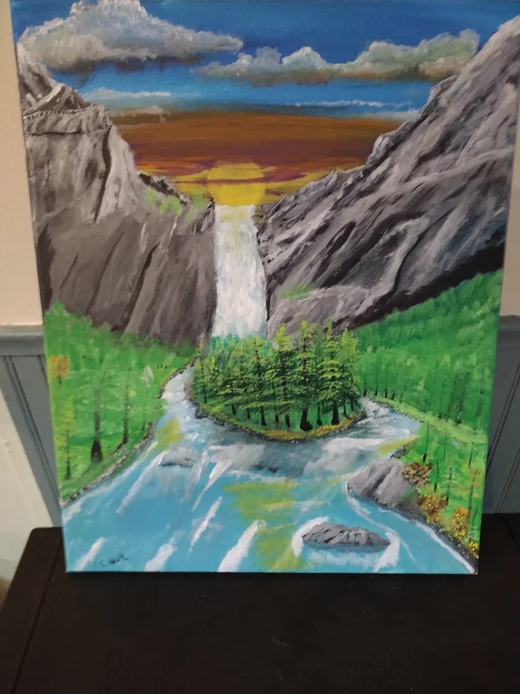 Serenity in Nature: A Majestic Sunset Over a Forest Waterfall and River
