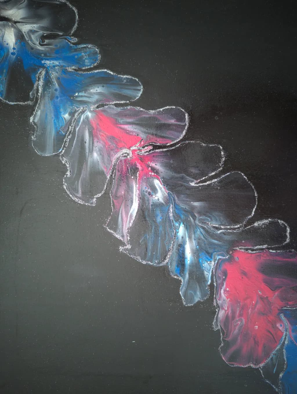 Whispers of Color: A Dance of Blue and Pink on Black Canvas