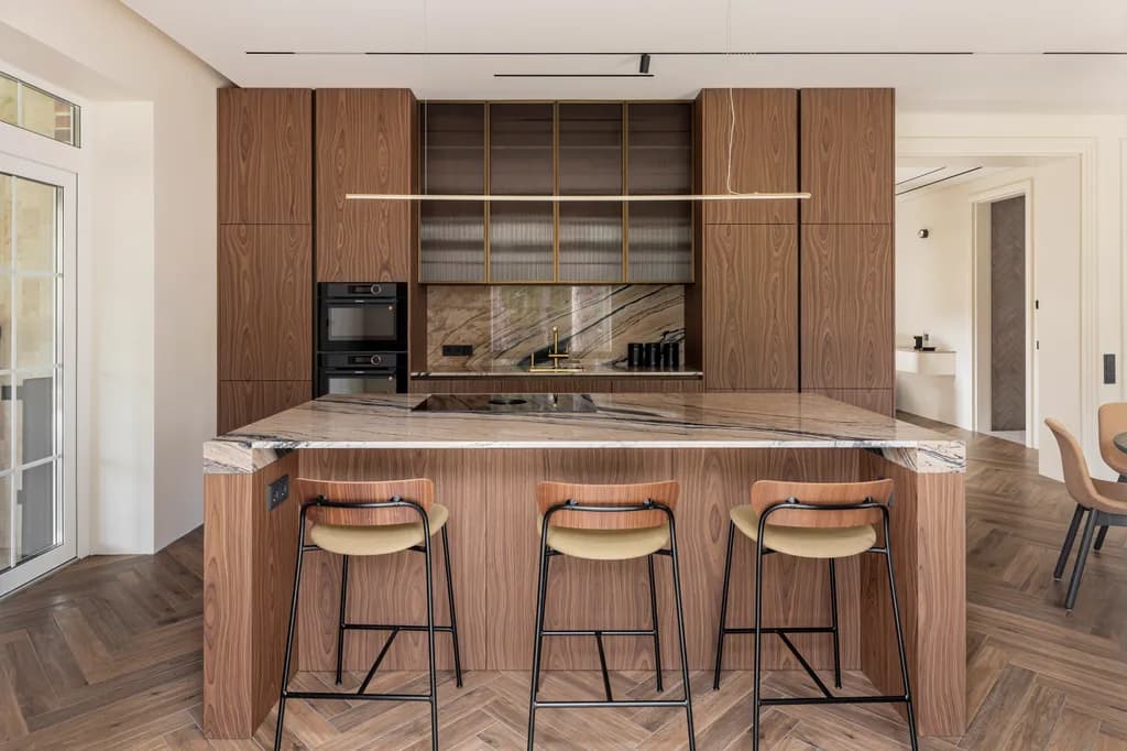 Modern Elegance: A Chic Kitchen Oasis with Warm Wood and Sleek Marble Accents