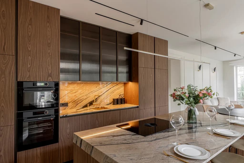 Elegant Harmony: A Modern Kitchen Oasis with Warm Wood and Luxurious Marble Accents