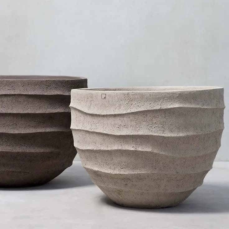Textured Elegance: Modern Ceramic Planters with Wavy Design