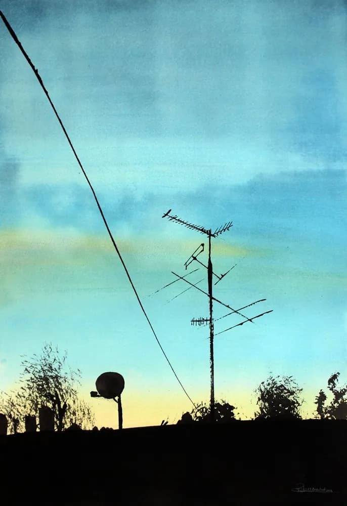 Evening Silhouettes: A Serene Landscape of Antennas and Sky Colors