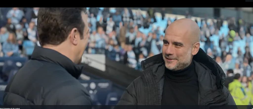A Moment of Connection: Coaches in Conversation Amidst the Crowd