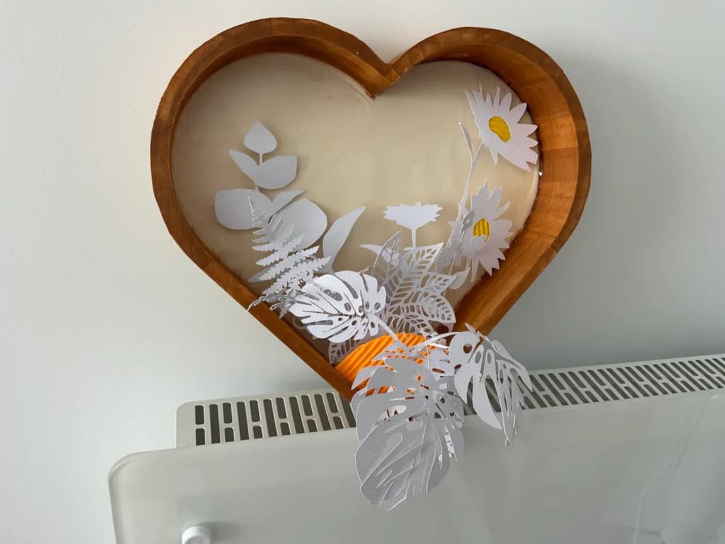 Whimsical Heart: A Delicate Dance of Paper Flora and Natural Wood