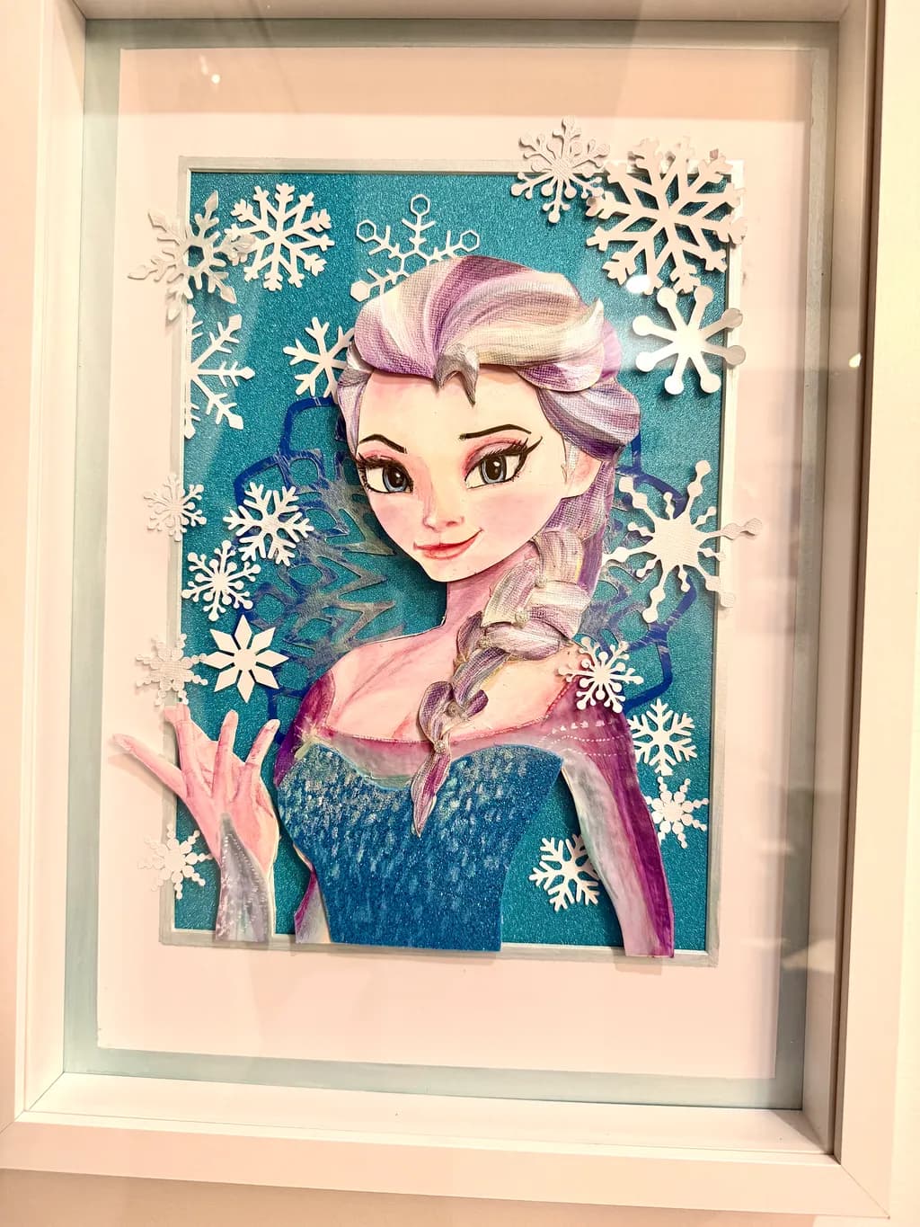 Frozen Elegance: A Whimsical Portrait of Elsa Amidst Snowflakes
