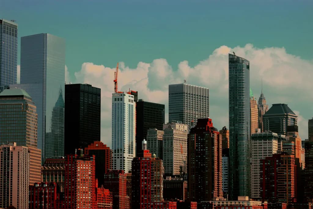 Urban Symphony: A Dance of Skyscrapers Against the Cloudy Canvas of the City Skyline