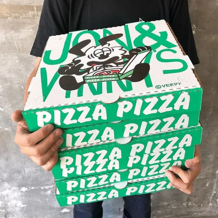 Whimsical Pizza Delivery: A Playful Stack of Flavorful Boxes