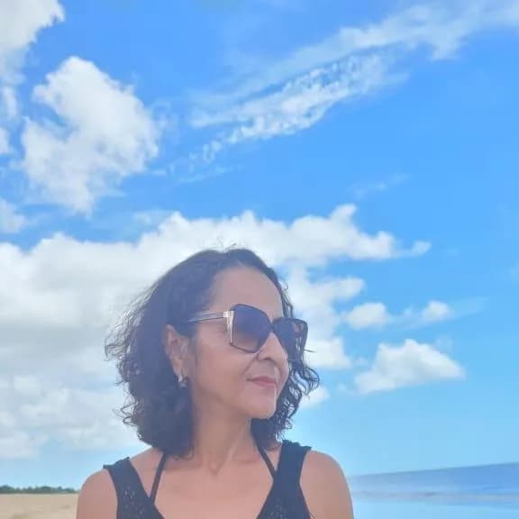 Serenity by the Shore: A Portrait of Grace Under the Sky's Embrace