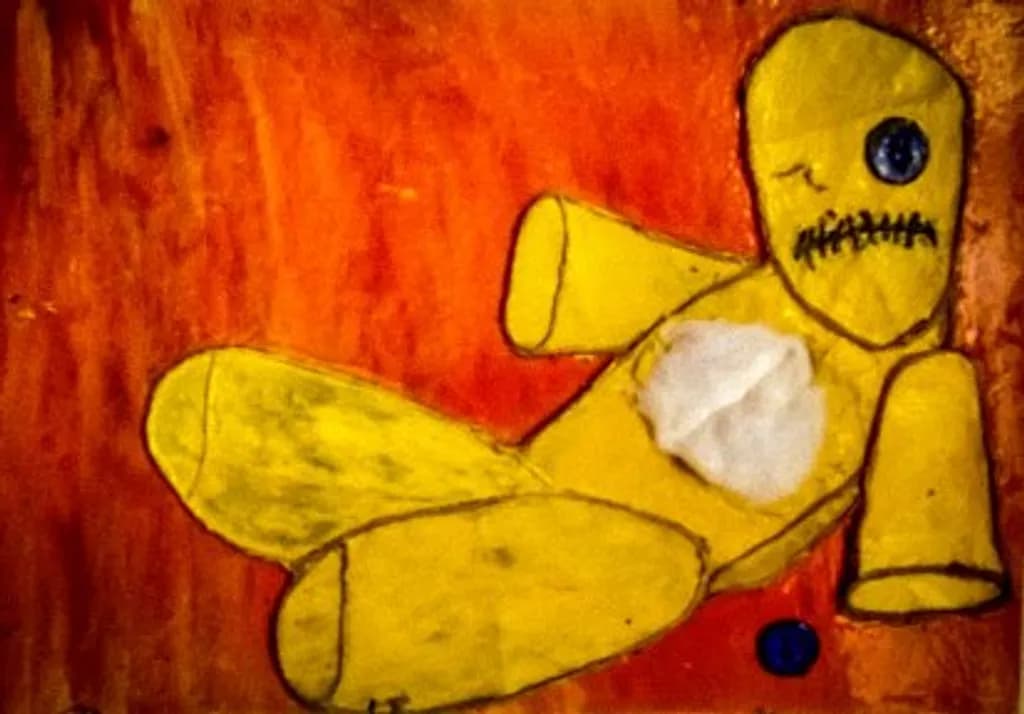 YELLOW DOLL WITH BROKEN SOUL