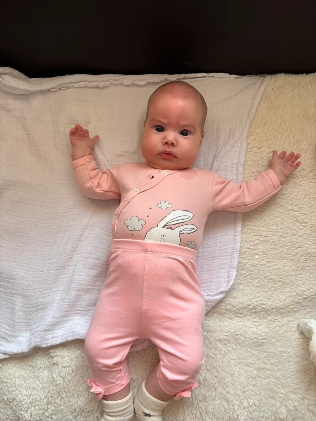 Adorable Baby in Pink Bunny Outfit: A Cherished Moment of Innocence