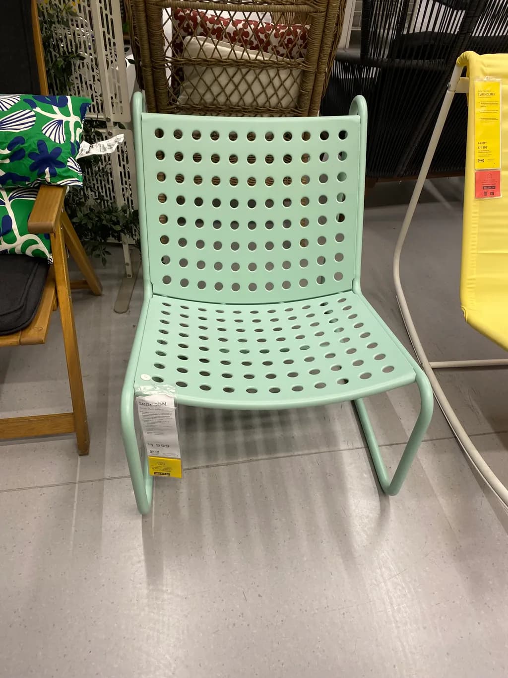 Modern Perforated Mint Chair: Lightweight Design for Contemporary Spaces