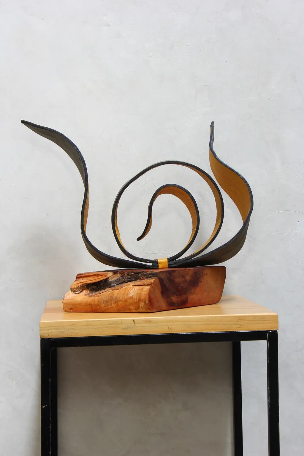 Whimsical Harmony: An Abstract Dance of Wood and Metal Sculpture
