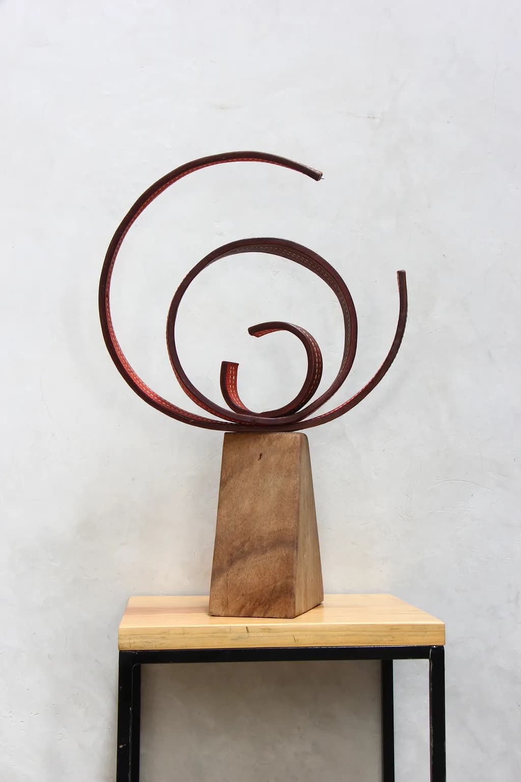 Whispers of Motion: A Sculptural Dance in Metal and Wood