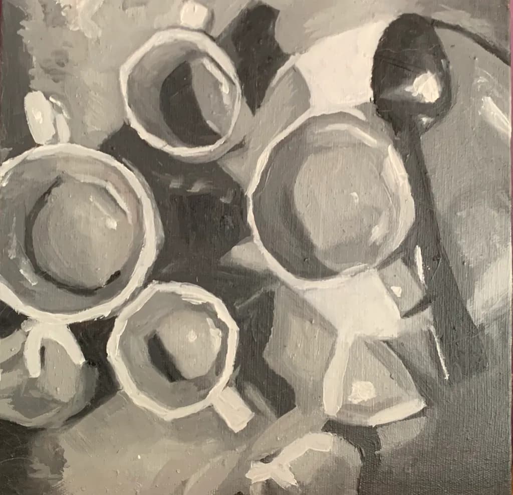 Whispers of Monochrome: A Study of Cups and Shadows