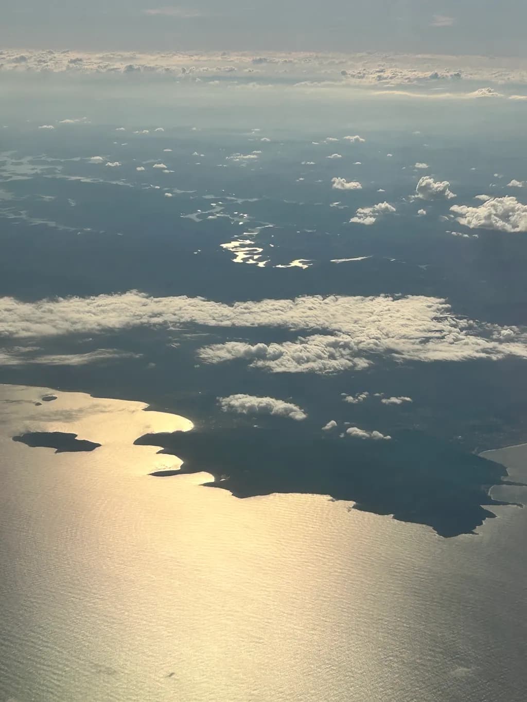 Serenity Above: Aerial Reflections of Land and Sea