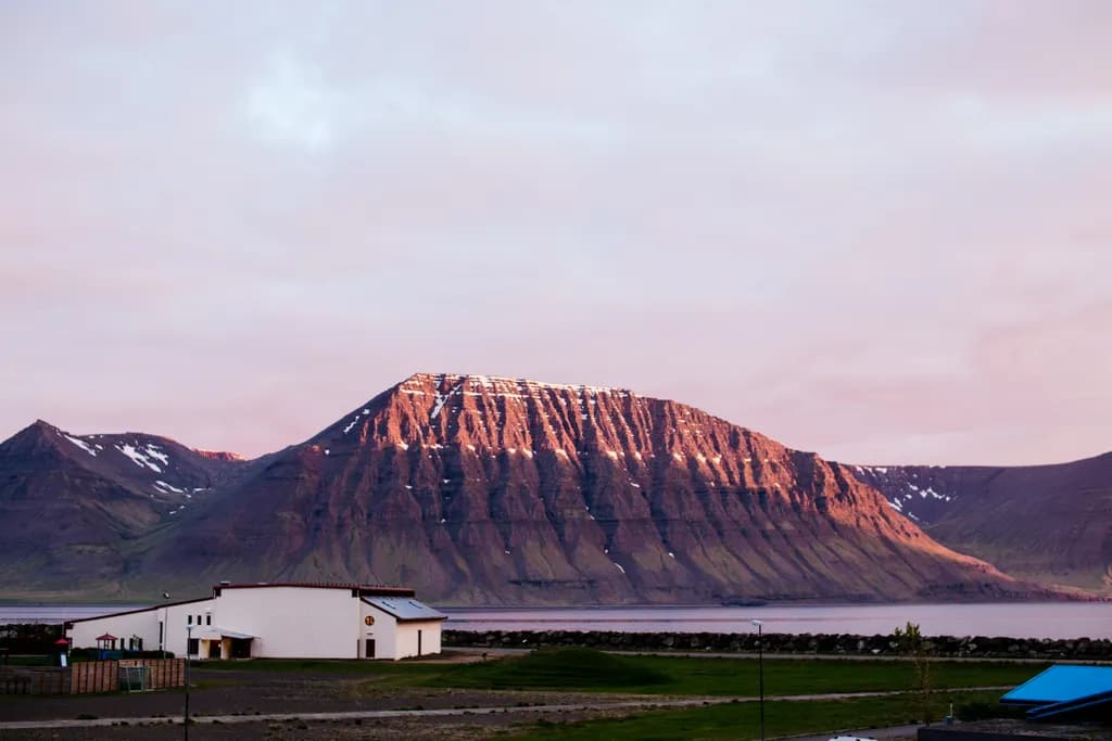 Majestic Peaks at Dawn: A Serene Landscape of Iceland's Westfjords