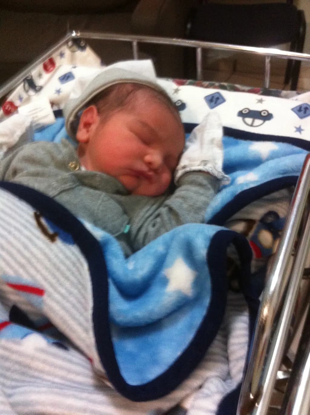 Dreamy Slumber: A Newborn's Peaceful Moment in Soft Blue Comfort