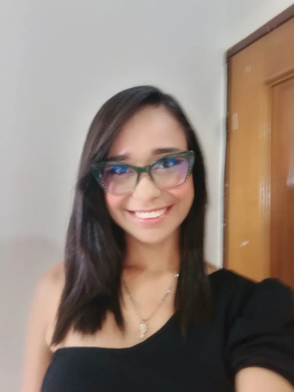 Confident Charm: A Portrait of Style and Smile in Glasses