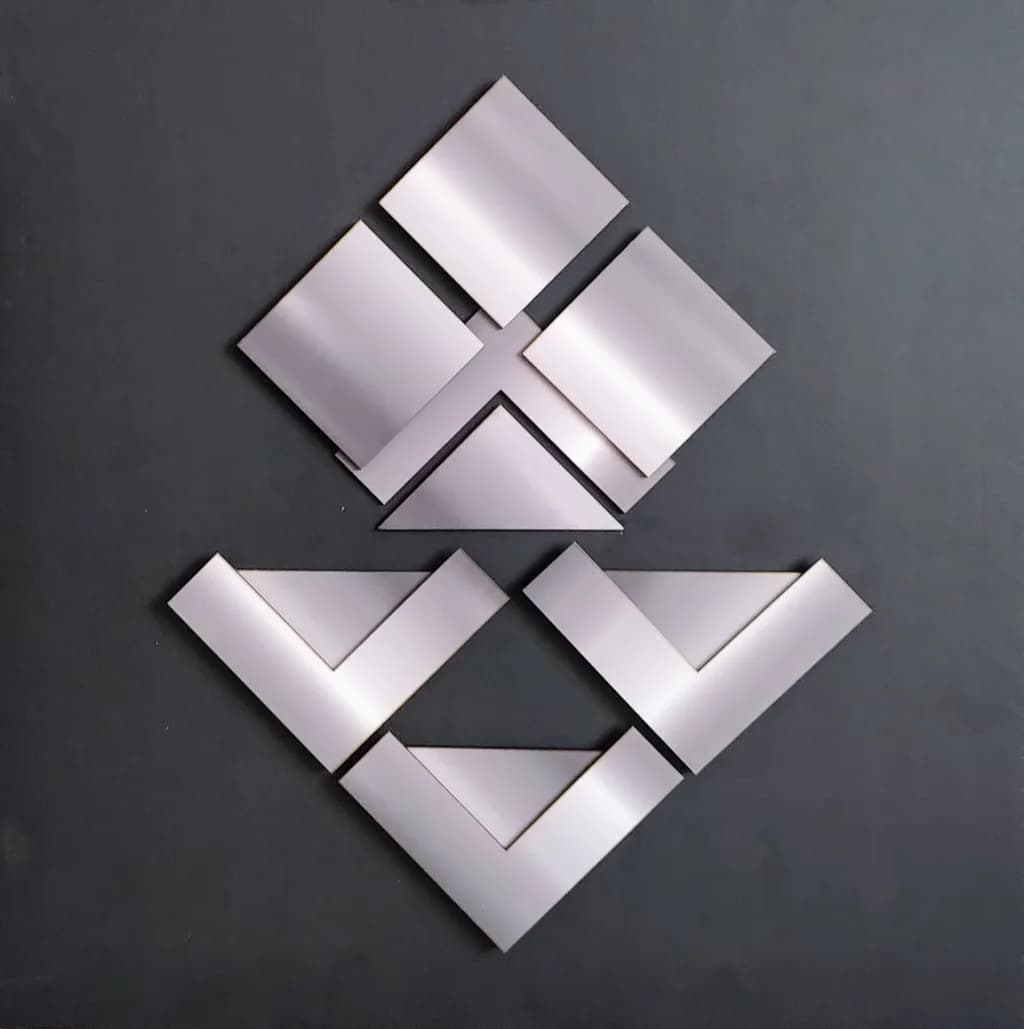 Geometric Harmony: A Modern Metallic Composition in Minimalist Design