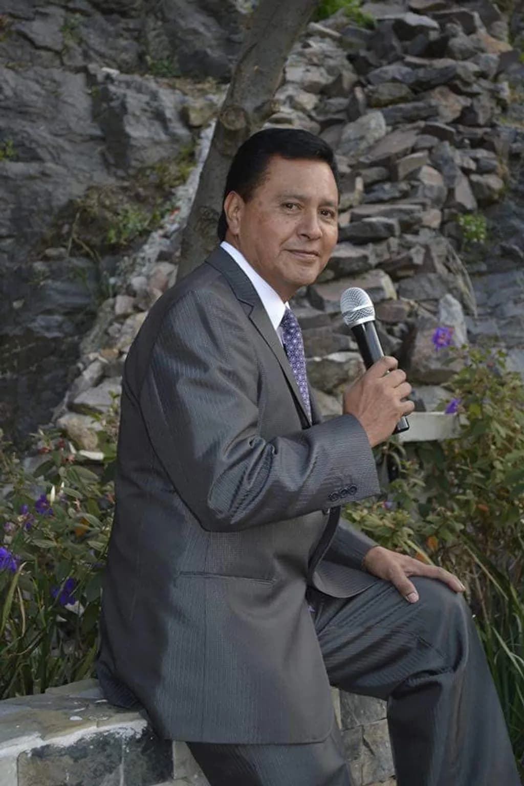 Man in Suit with Microphone