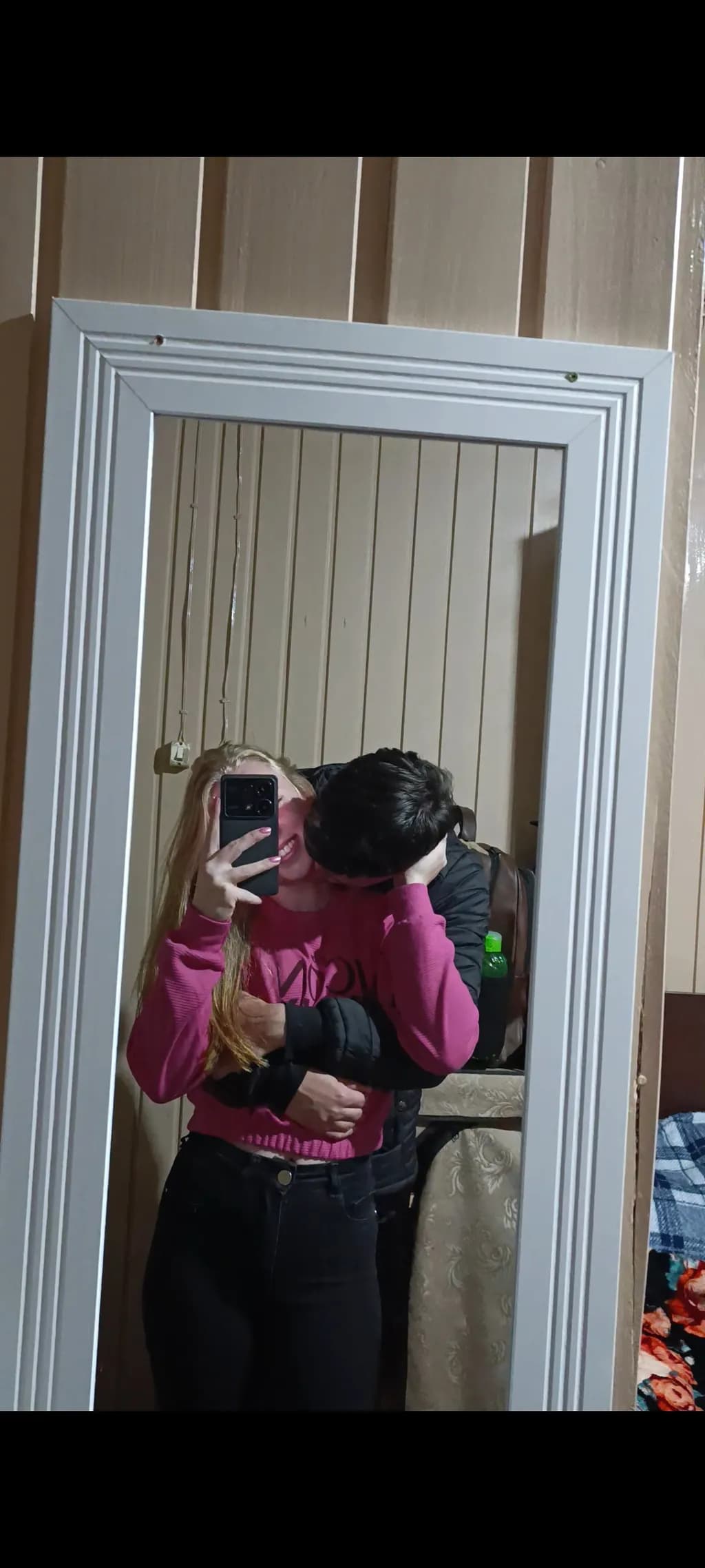 Reflections of Love: A Mirror Moment Captured in Time