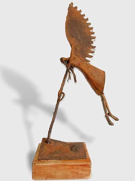 Soaring Spirit: A Rusted Metal Sculpture of Freedom and Flight