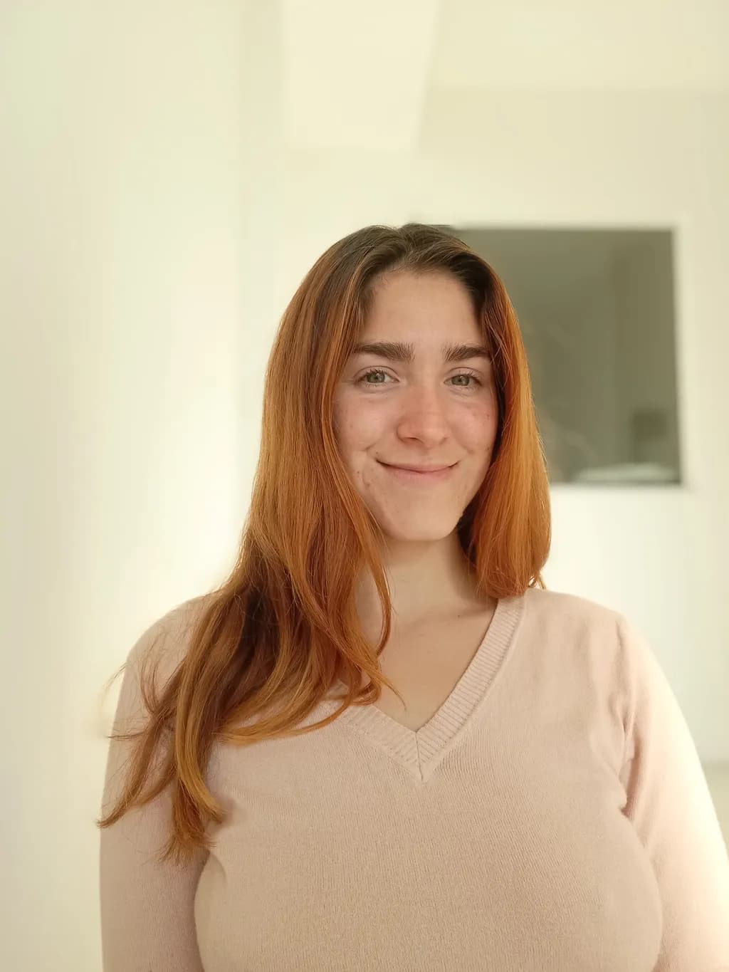 Radiant Confidence: A Portrait of Relaxed Joy in Soft Light