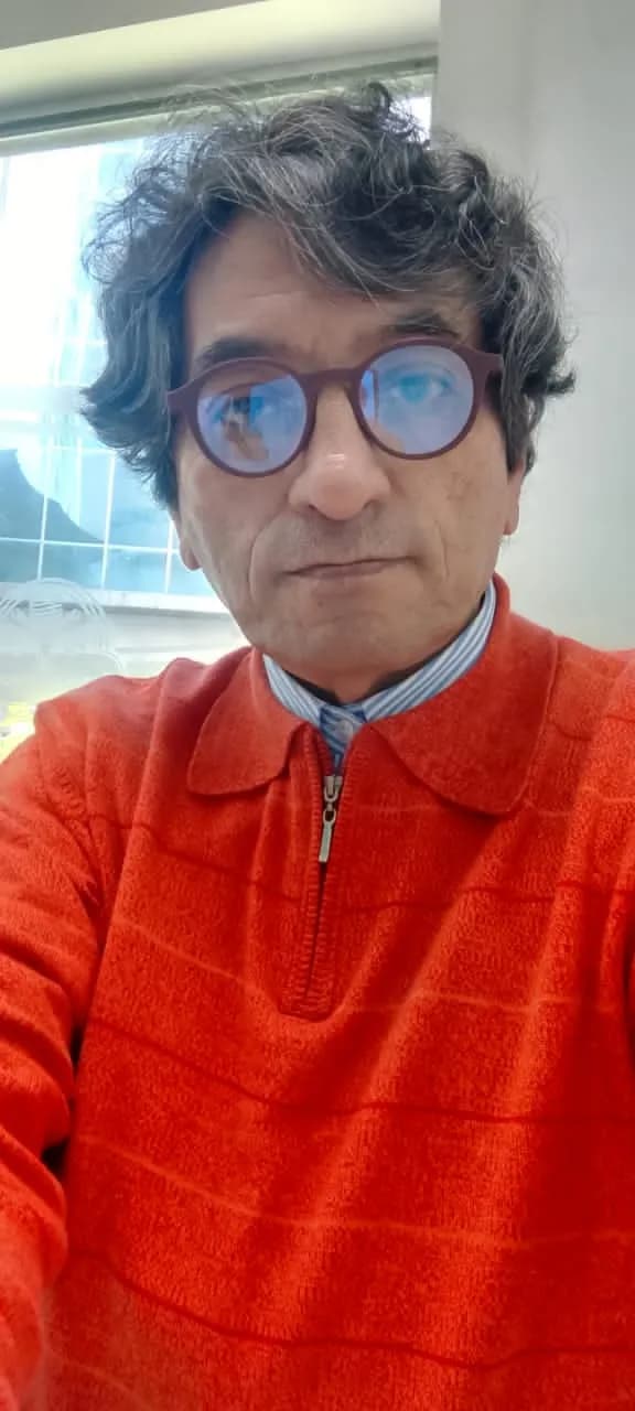 Vibrant Reflections: A Portrait in Orange and Glass