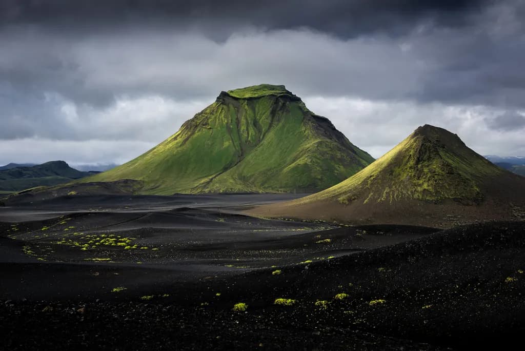 Emerald Peaks: A Dance of Green and Black in Iceland's Volcanic Landscape