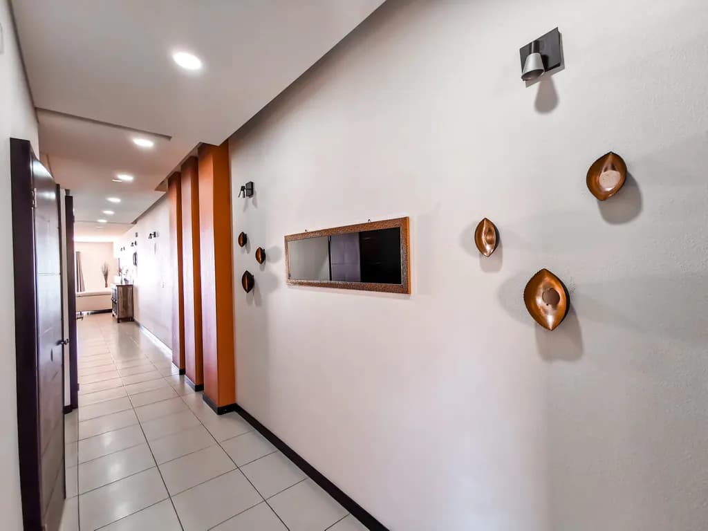 Elegant Hallway Serenity: A Modern Fusion of Light and Texture