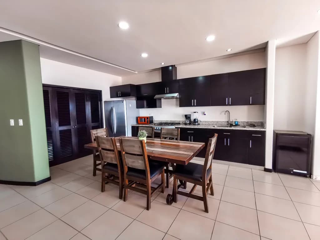 Modern Elegance: A Chic Kitchen Dining Space with Rustic Charm