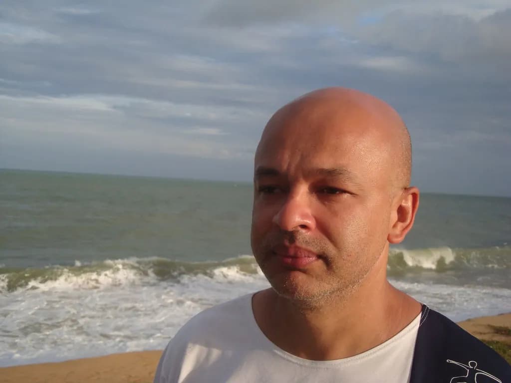 Serenity by the Shore: A Contemplative Moment at the Ocean's Edge