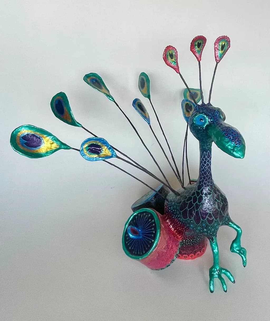 Vibrant Peacock Sculpture: A Colorful Fusion of Art and Nature