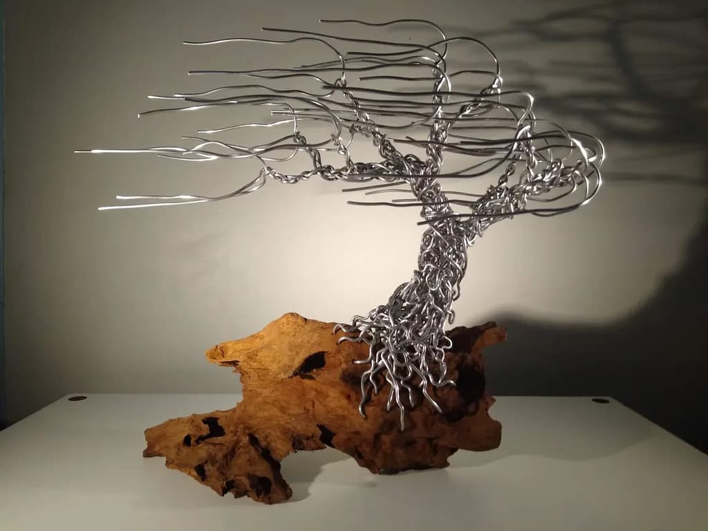 Whispers of Nature: A Metal and Wood Tree Sculpture Embracing Life's Flow