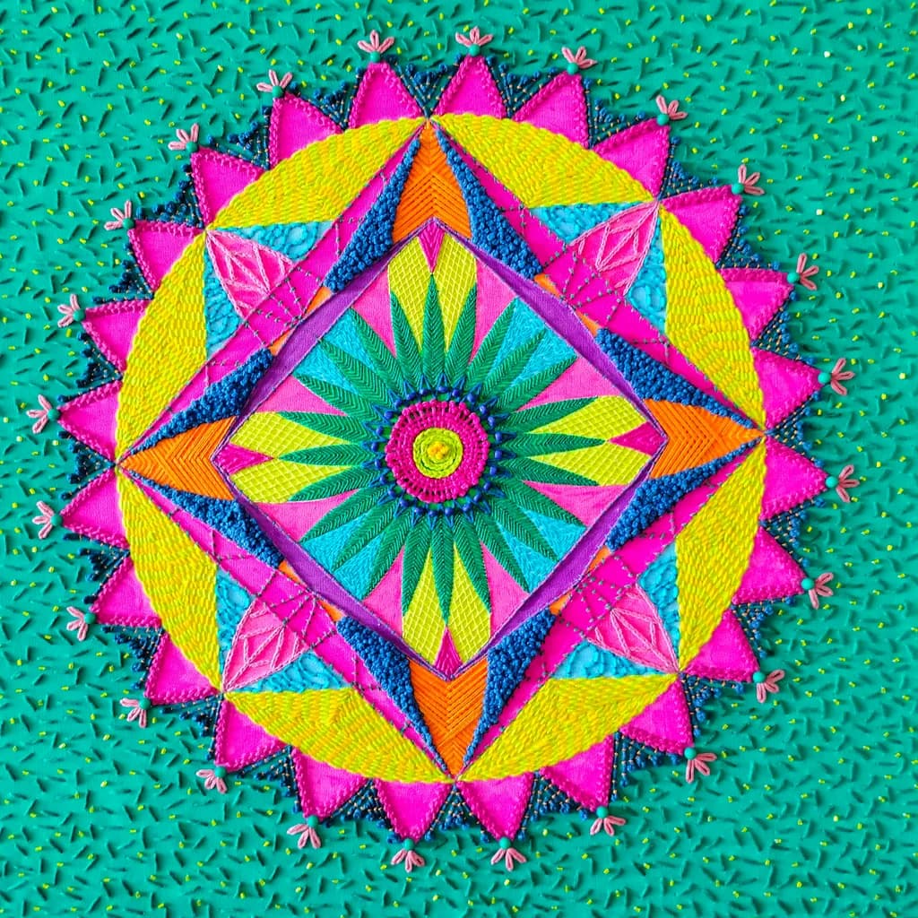 Vibrant Mandala: A Colorful Embroidery Design Celebrating Artistic Patterns and Textures