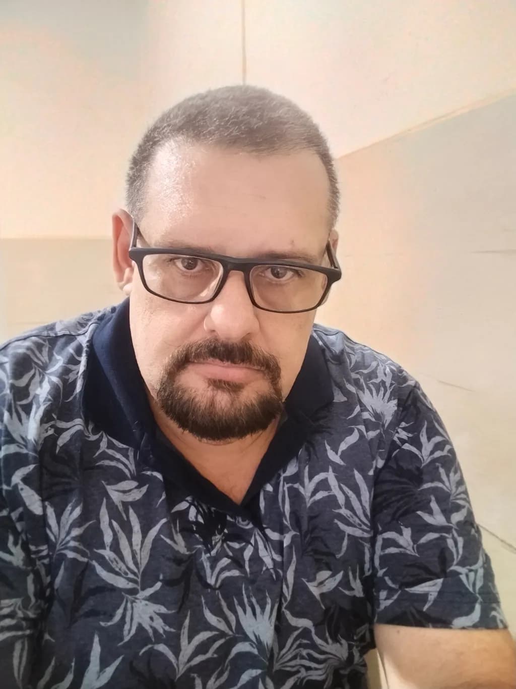 Focused Gaze: A Casual Portrait with Floral Undertones