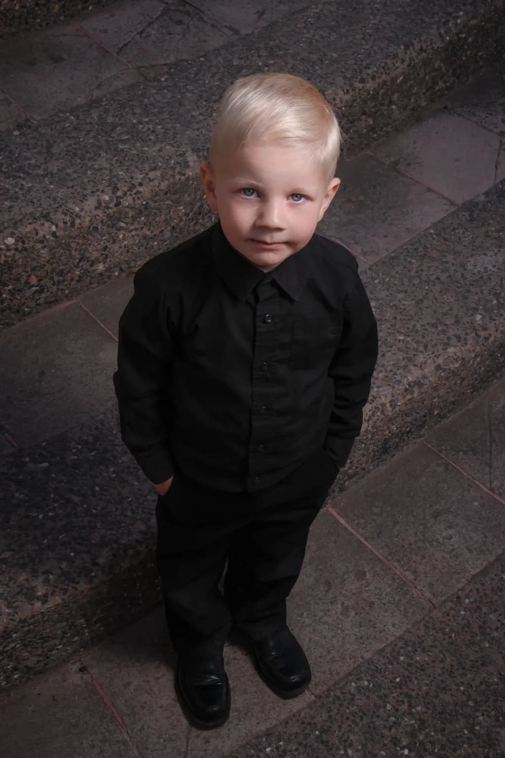Whispers of Innocence: A Young Boy in Timeless Elegance