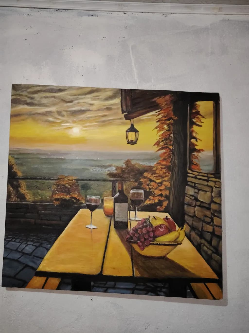 Golden Hour Serenity: A Rustic Table Setting with Wine and Fruit in Autumn's Embrace