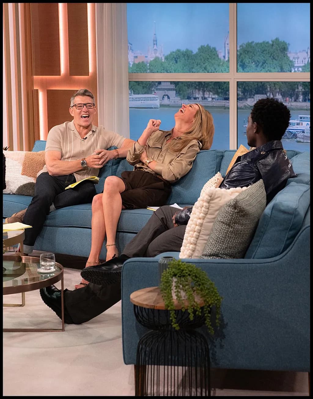 Laughter and Connection: A Joyful Moment on the Couch