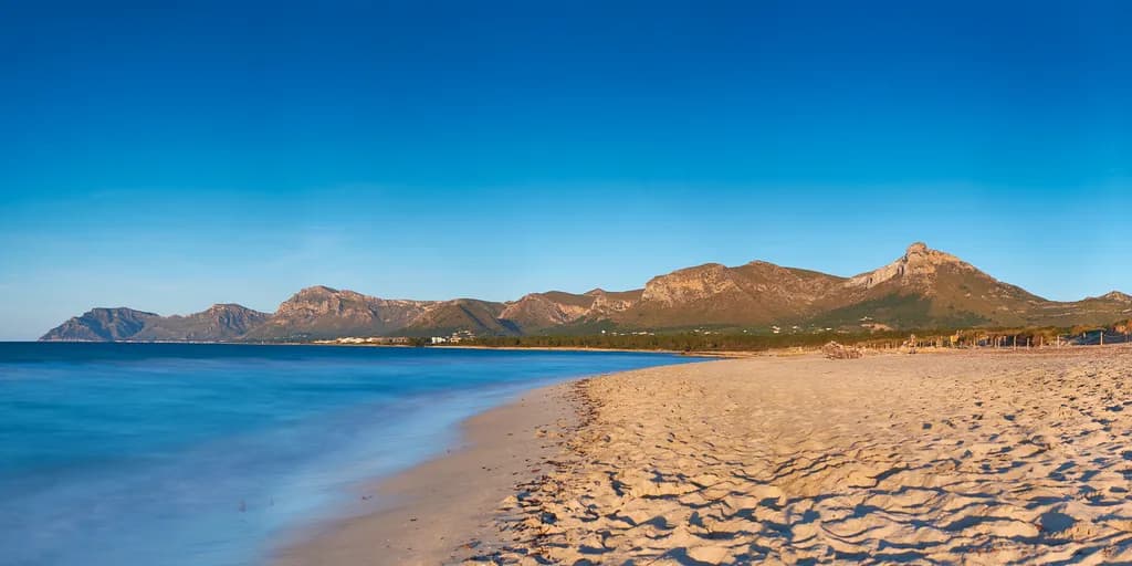 Serenity by the Shore: A Tranquil Beach Landscape at Dusk