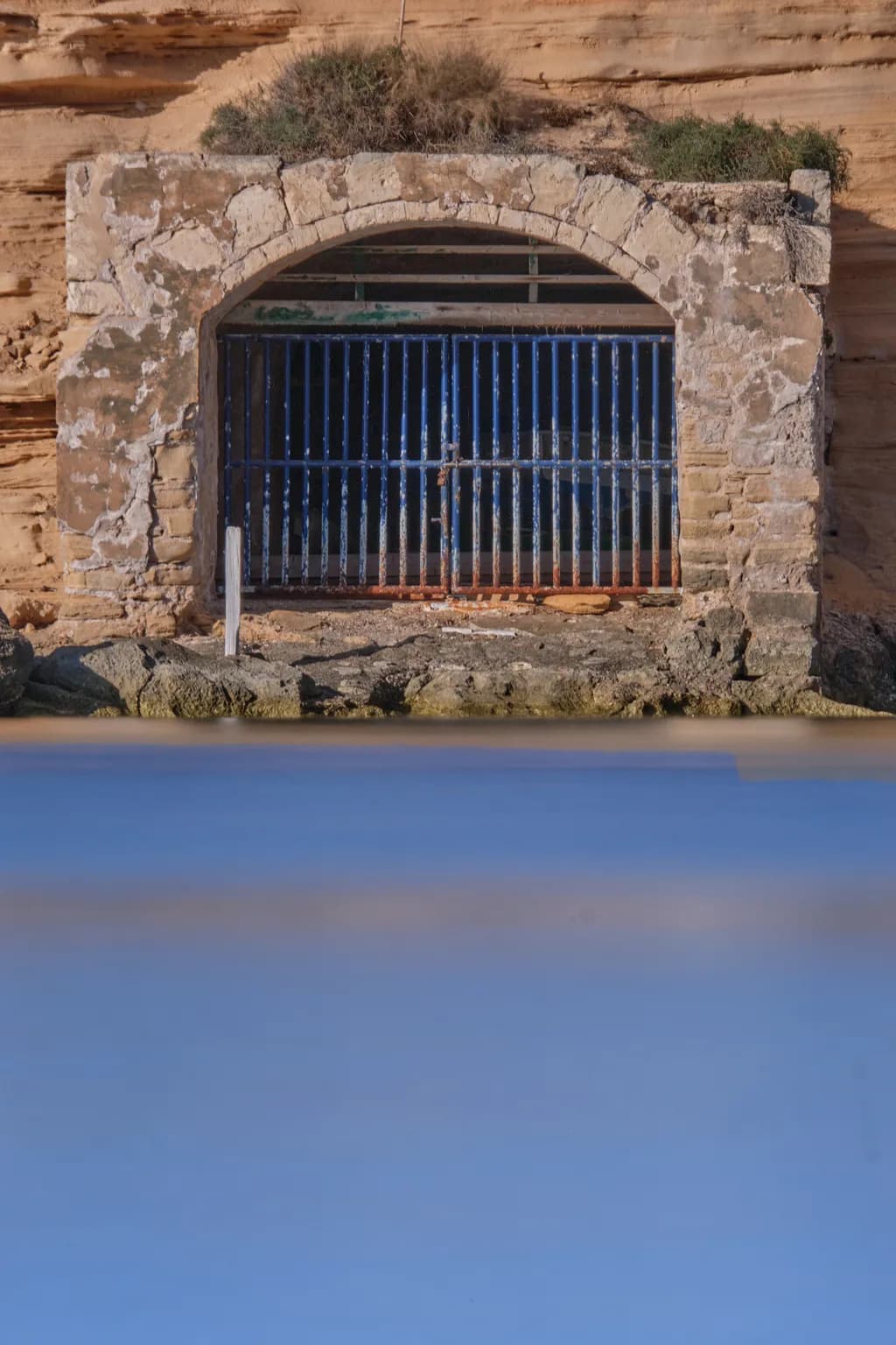 Whispers of Time: The Blue Gate Beneath the Surface