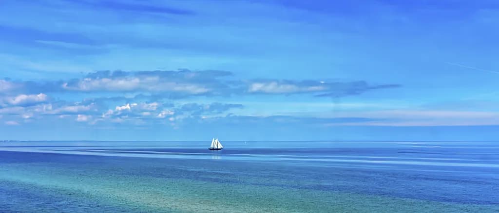 Serenity at Sea: A Tranquil Voyage Beneath the Endless Blue Sky