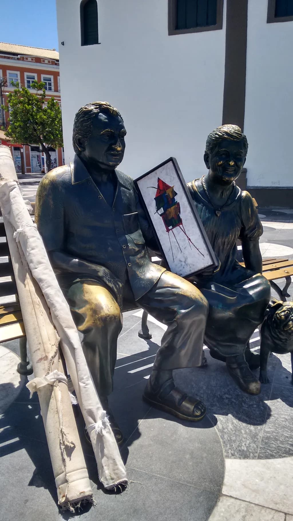 Whispers of Time: A Bronze Portrait of Companionship in the Park