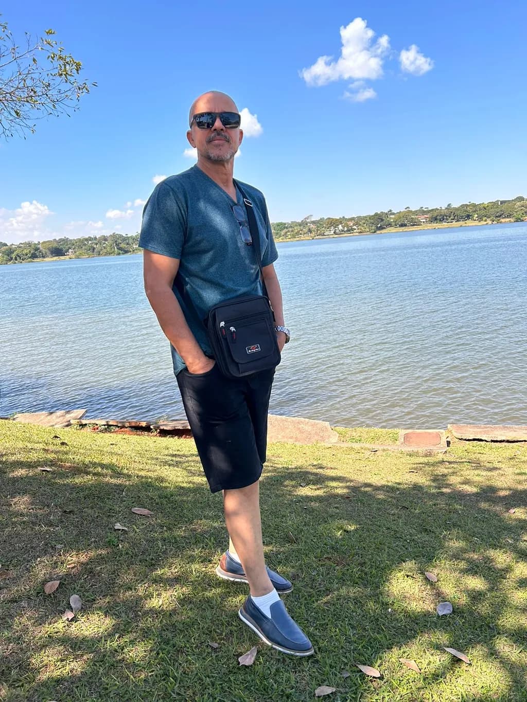Serene Reflections: A Stylish Stroll by the Water's Edge