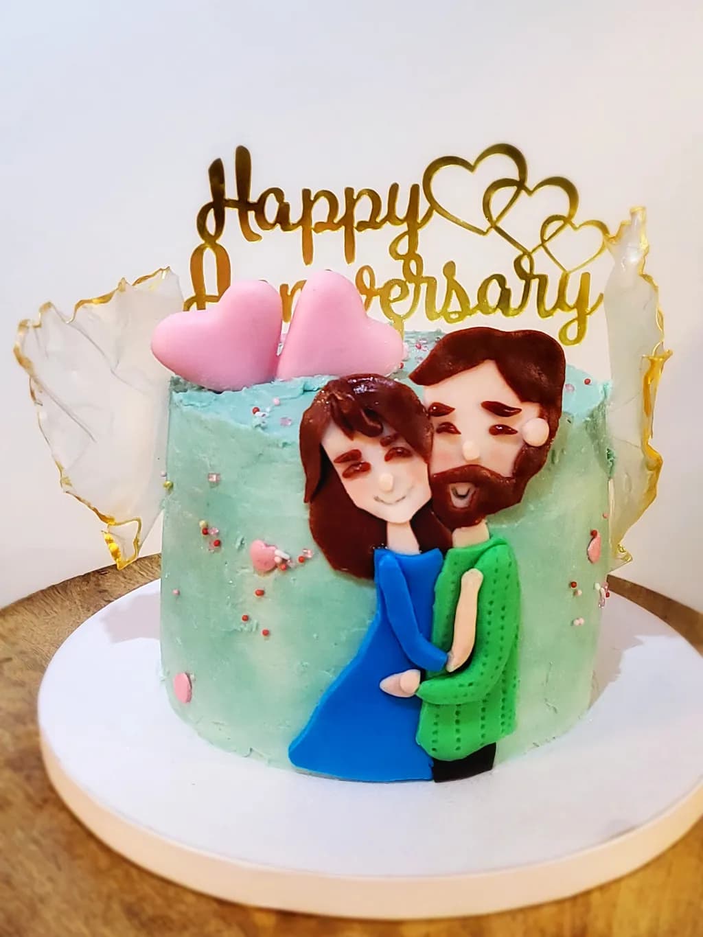 Whimsical Anniversary Cake: A Sweet Celebration of Love with Custom Figurines and Delicate Decor