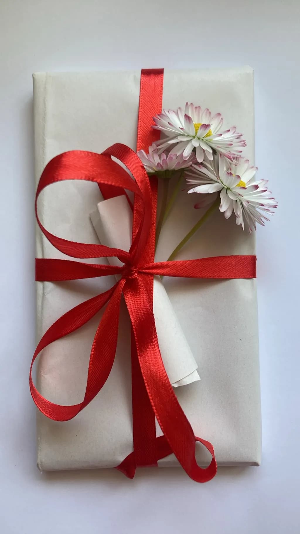 Whispers of Joy: A Gift Wrapped in Love and Blooms