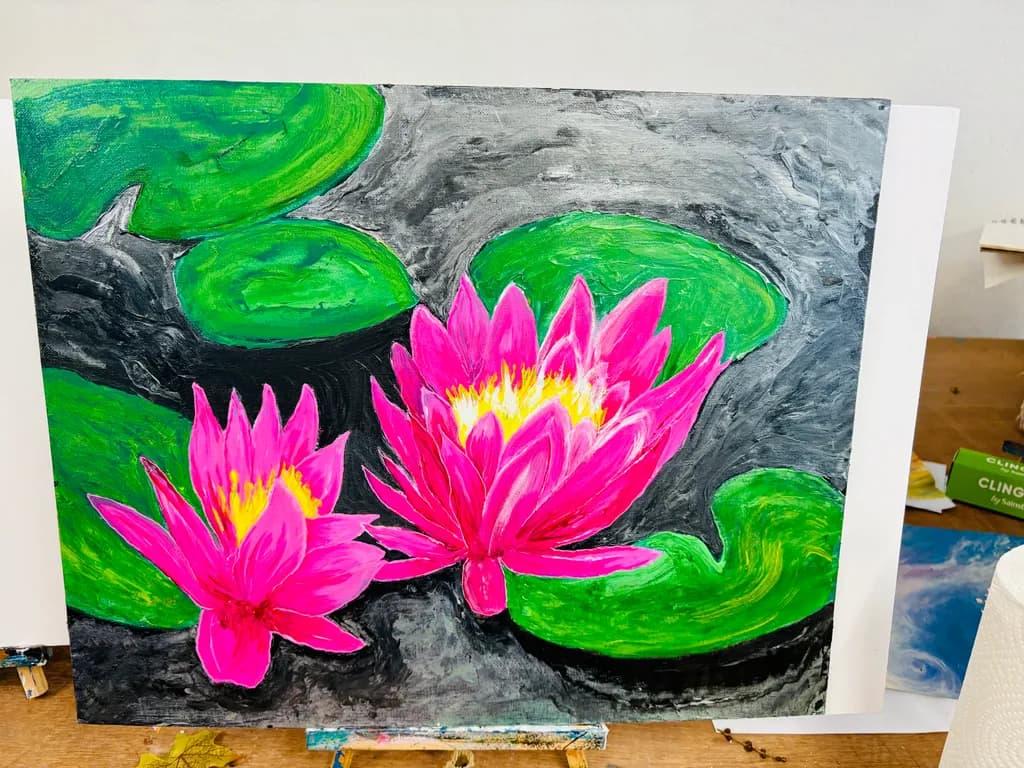 Serenity in Bloom: Vibrant Pink Water Lilies on a Tranquil Canvas