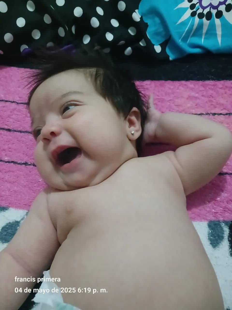 Joyful Innocence: A Cherubic Smile Captured in Time