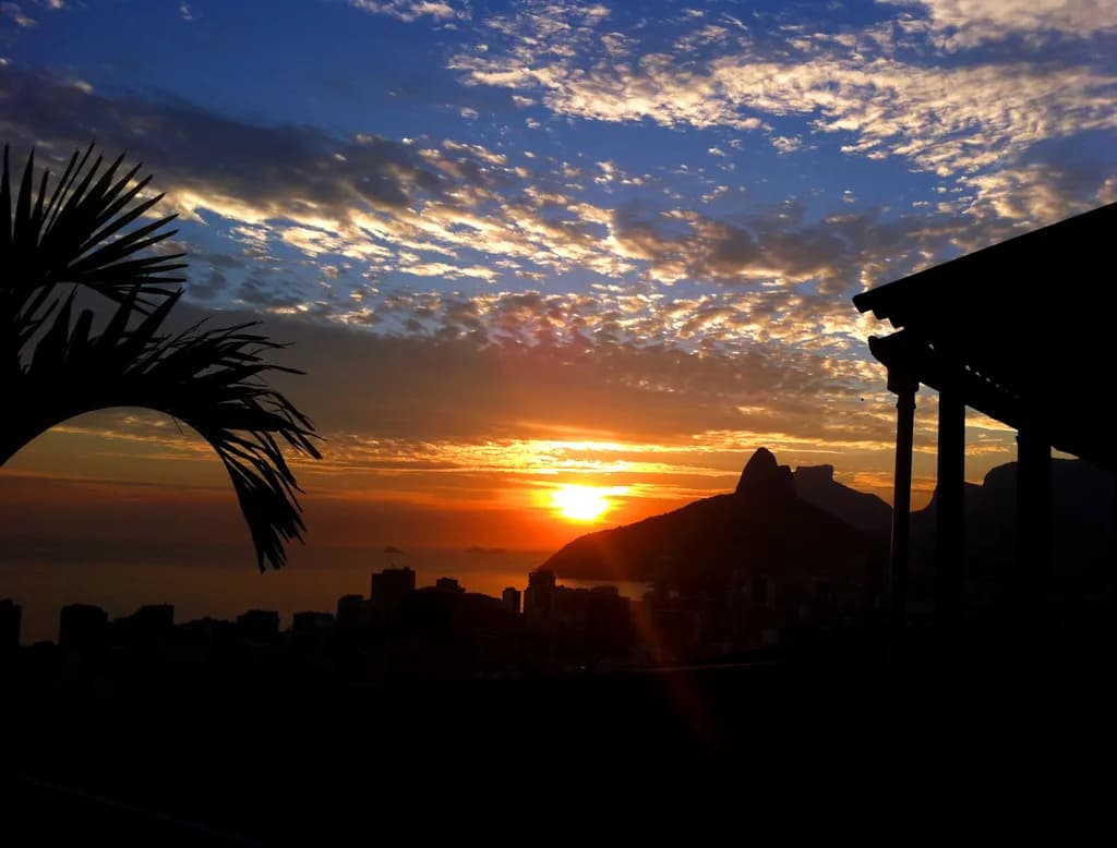 Sunset Serenity: A Breathtaking Cityscape Embraced by Nature's Palette
