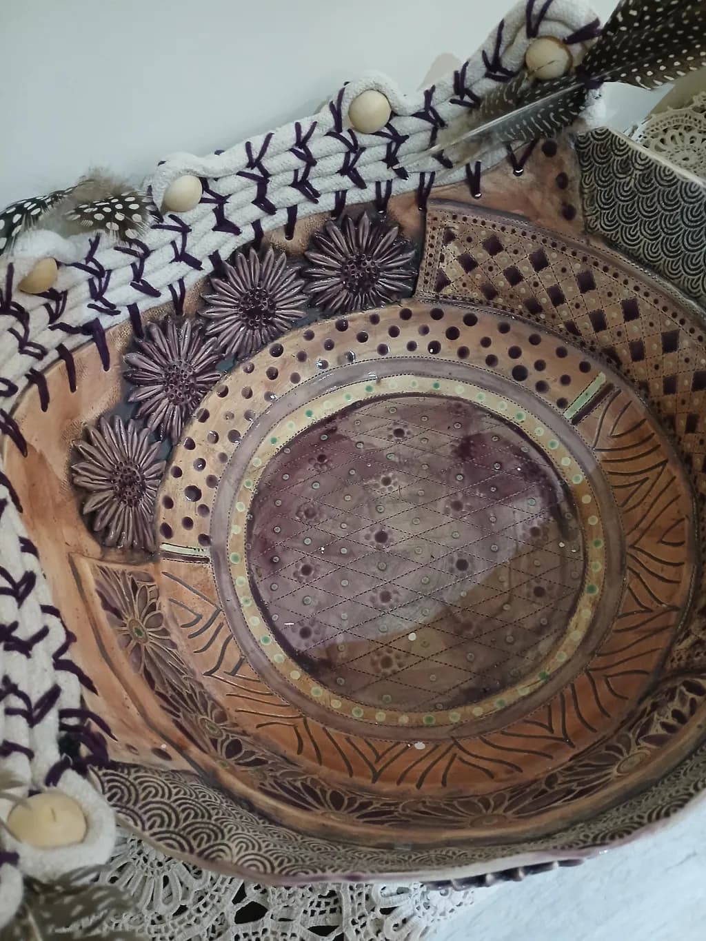 Whimsical Harmony: A Handcrafted Decorative Bowl with Intricate Patterns and Textures